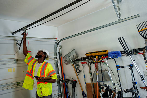 Professional Garage Door Panel Replacement technician working in Marion County County, MS